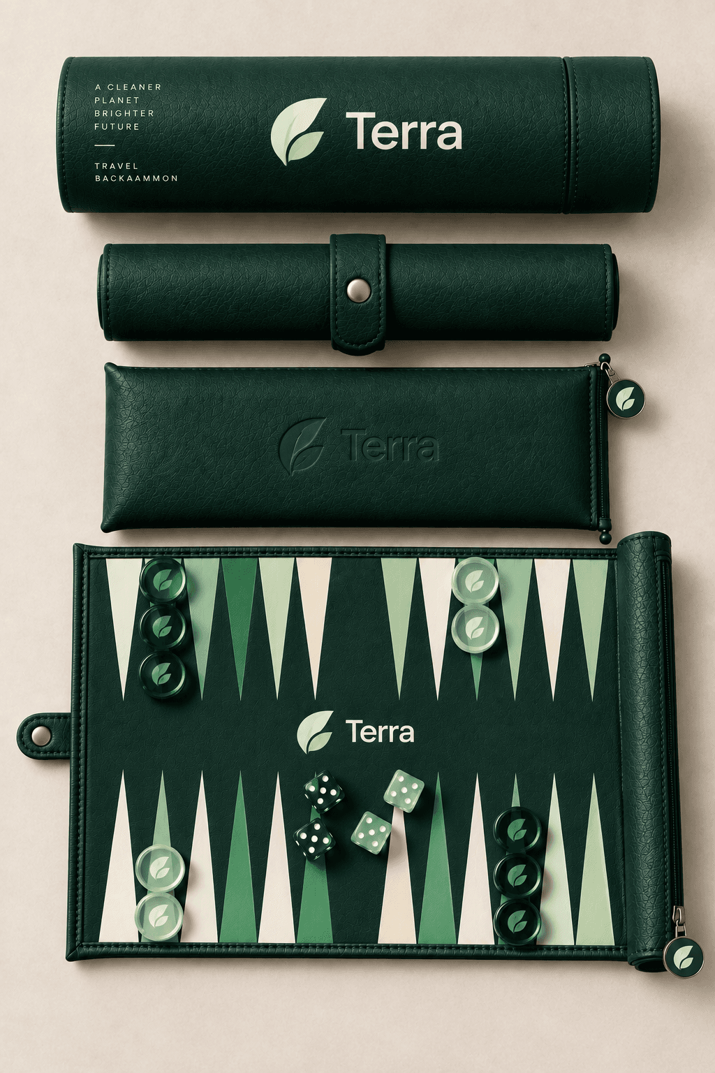 The signature roll-up set in Terra livery — dark green leather tube and pouch with a leaf mark and a green-toned backgammon board